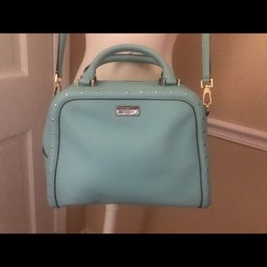 Beautiful slightly vintage but never used Kate Spade bag. Lovely soft teal.